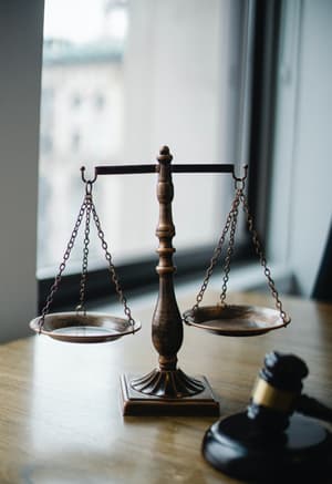 An image of legal scales that symbolize mediation services.